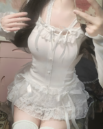 White soft girl aesthetic laced skirt with lace trim and ribbons. Delicate details and ruffled layers.