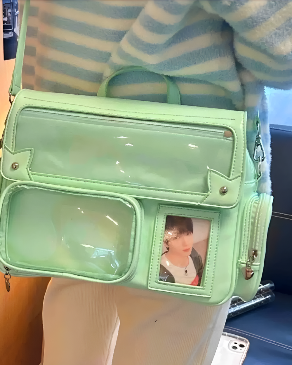 Green Strapped Ita Bag - Korean Edition with clear pocket displaying a photo.