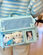 Blue Korean edition ita bag with clear pocket displaying photos and accessories. Ideal for Kpop fans.