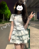 Model wearing a Sugarcloud Ruffle-Zip Coord, showcasing the light blue Yume Kawaii Coord with a ruffled skirt and zip-up top.