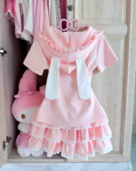 Pink Sugarcloud Ruffle-Zip Coord hanging in a wardrobe, a beautiful example of Yume Kawaii Coord fashion.