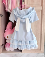 Blue Sugarcloud Ruffle-Zip Coord hanging in a closet, a cute Yume Kawaii Coord with ruffle details.
