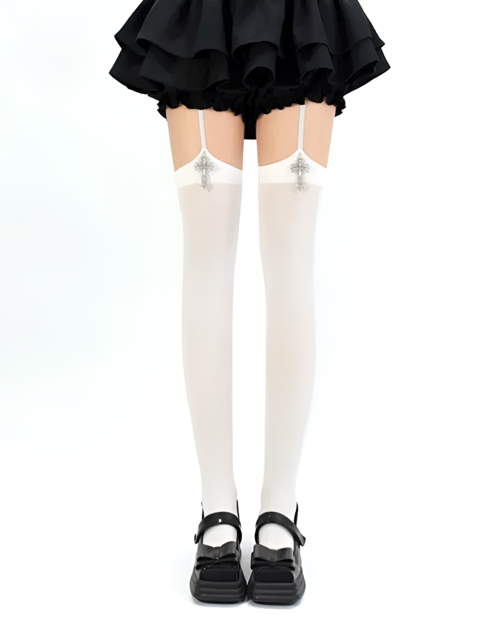 White suspender cross socks paired with a black skirt and Mary Janes.