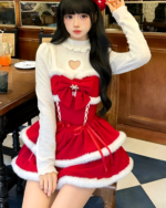 Model wearing a Sweet Lolita dress, crimson red, with white trim and a heart-shaped neckline. Ideal for winter events.