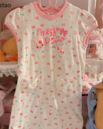 Pink Sweet Lolita top with a floral and butterfly pattern, featuring the "Mezzo Piano" logo. A cute aesthetic style.