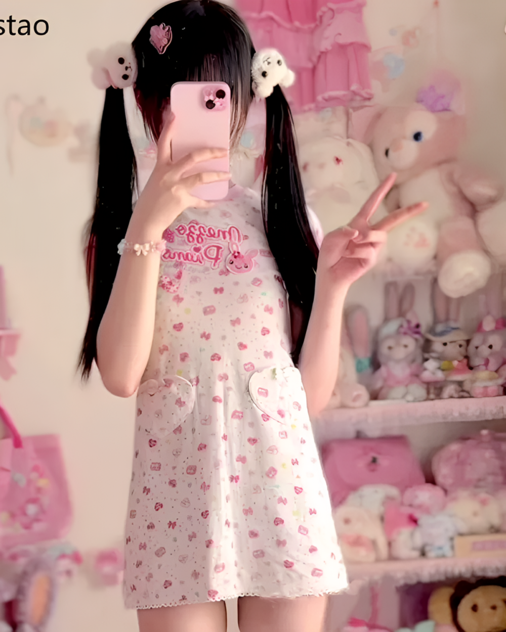 Model wearing a pink Sweet Lolita top with a floral pattern and short sleeves. Jojifuku aesthetic fashion.