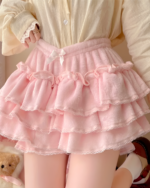 Pink Sweet Lolita Plush Skirt with ruffles and bow detail.