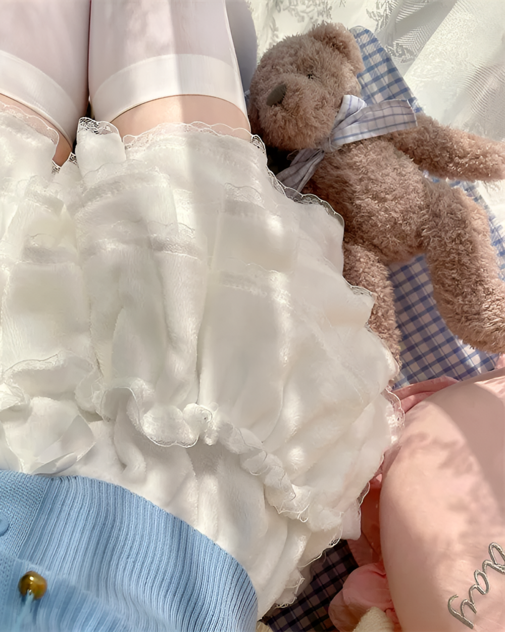 White Sweet Lolita Plush Skirt with lace trim, featuring a teddy bear.