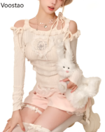 Creamy Sweet Lolita Set featuring a long-sleeved top with lace trim and shorts, accessorized with a plush bunny.