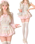 Sweet Lolita set: A three-piece bunny tea outfit featuring a dress, corset, and thigh-high socks.
