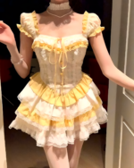 Yellow Sweet Lolita dress with ruffles, lace, and a corset-style bodice.