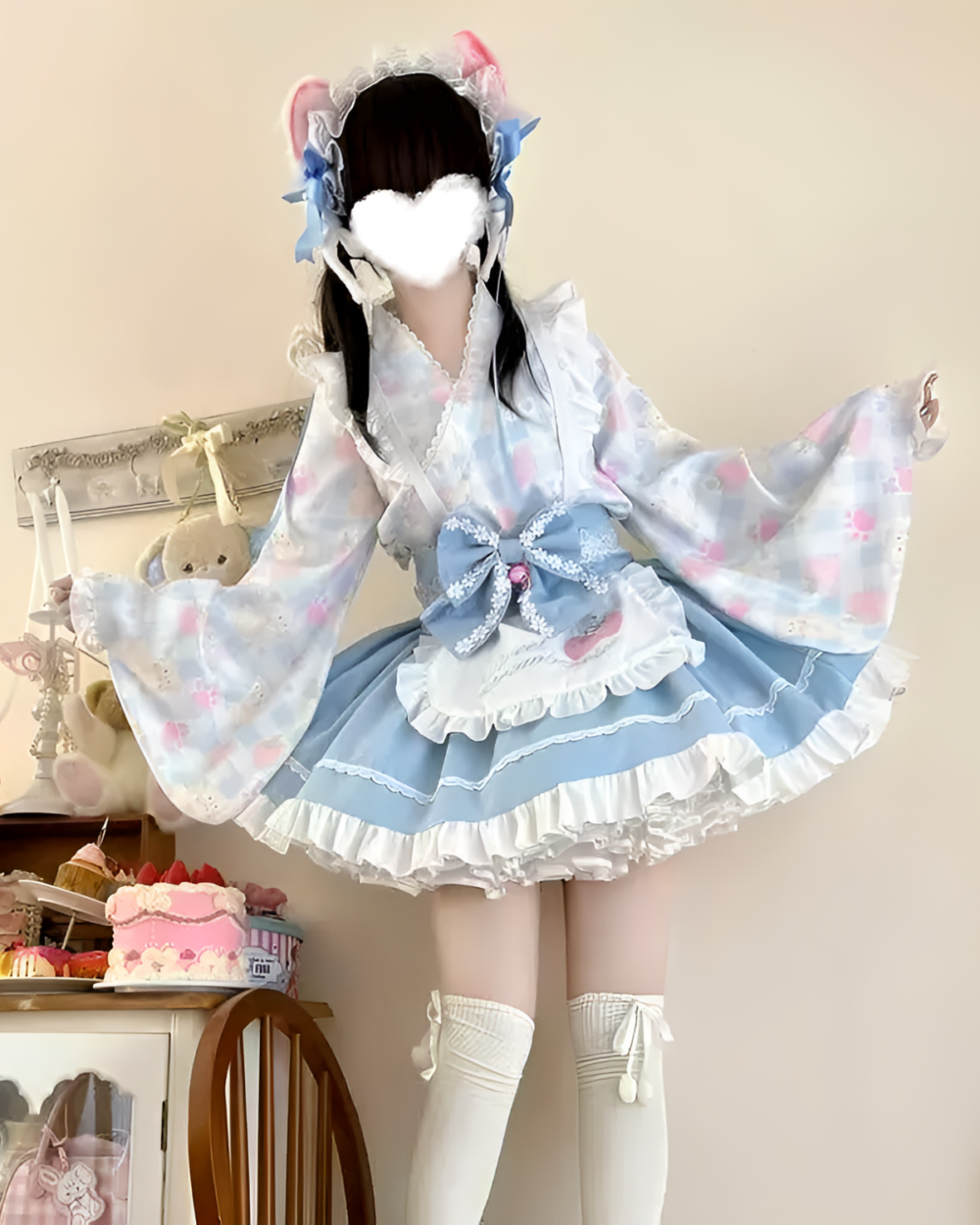 Blue sweet lolita dress with floral details and accessories.