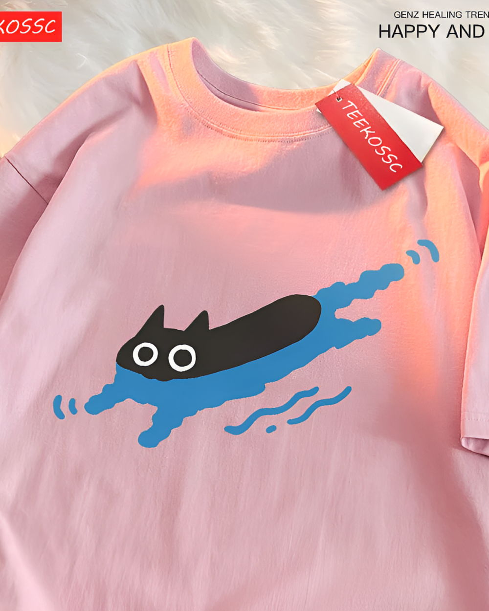 Pink tee with a graphic of a black cat swimming. Features the Kuro Neko T-Shirt design, ideal for casual wear.