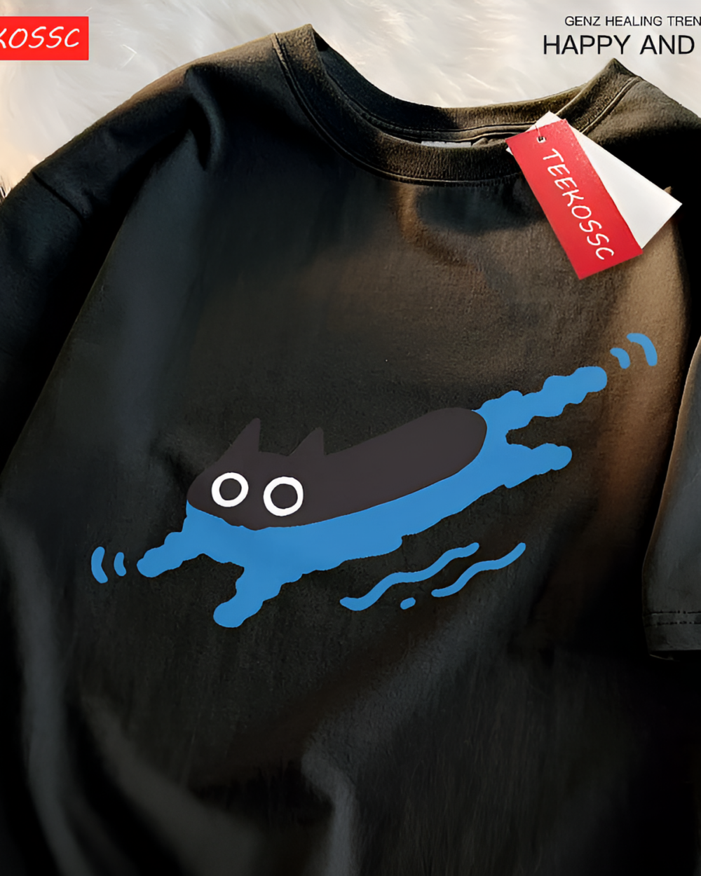 Black Kuro Neko T-Shirt featuring a blue cat swimming illustration. Tag attached. Casual wear.