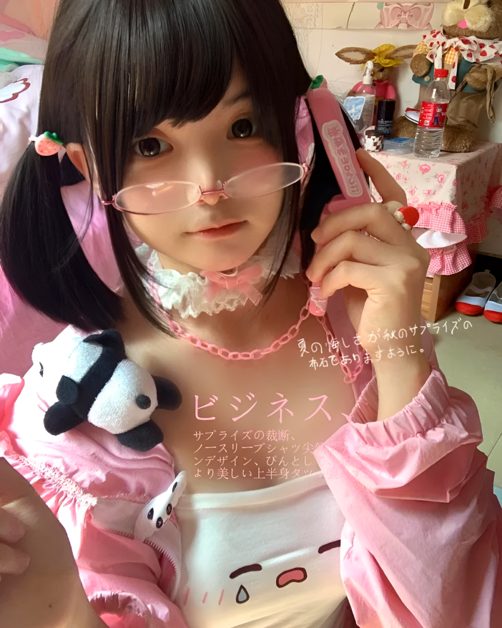 Person wearing a pink Tearful Chibi Kaomoji Camisole with heart-shaped sunglasses, posing indoors.