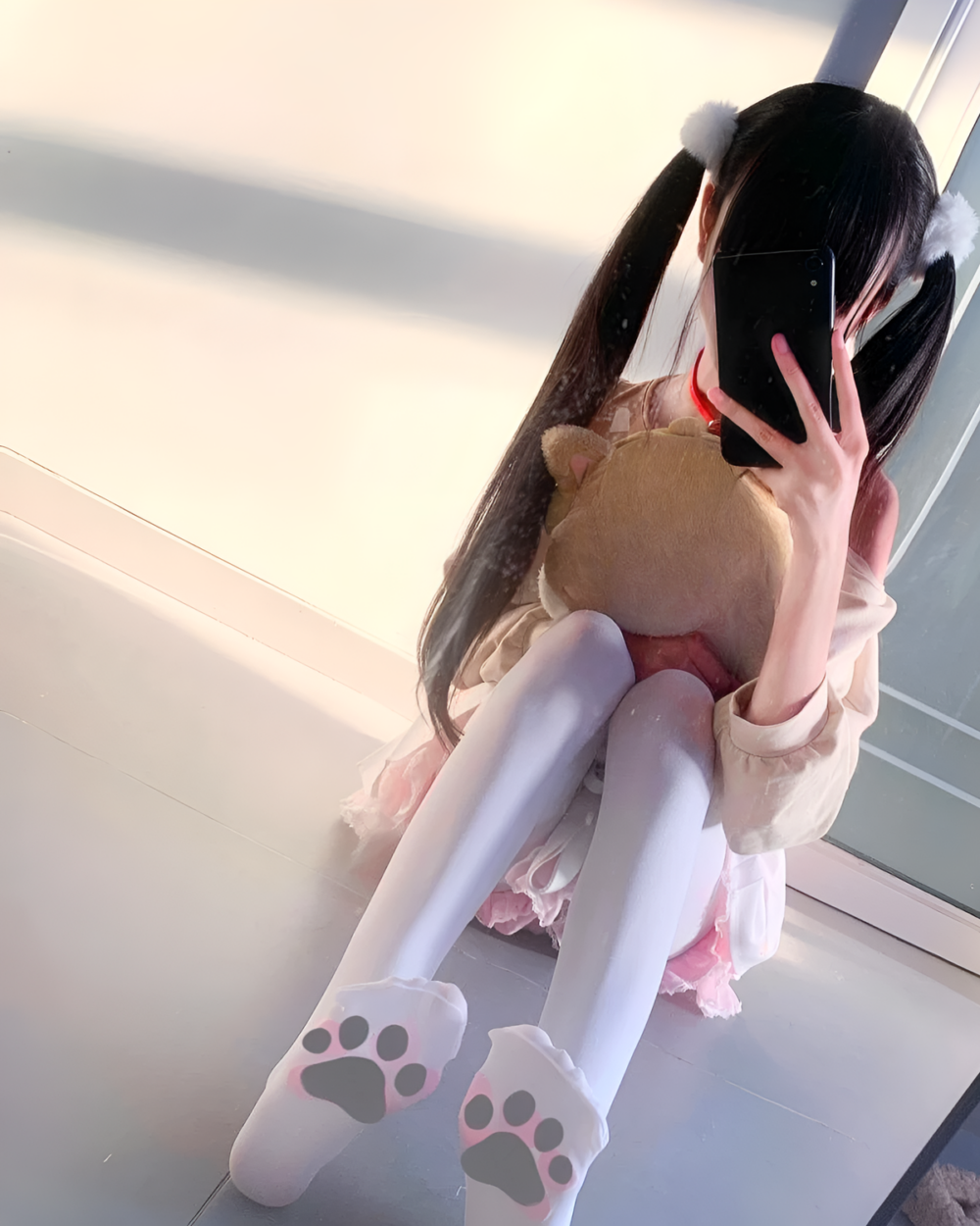 Person holding a teddy bear and wearing white paw socks, showcasing the aesthetic with a Doggy Sweatshirt style.