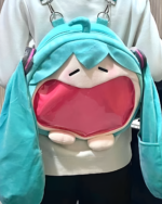 The Incredible Miku Plush Bag, a blue plush backpack with a detailed design and carrying strap.
