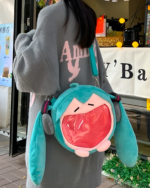 The Incredible Miku plush bag, featuring a cute Miku plush design, is worn as a shoulder bag.