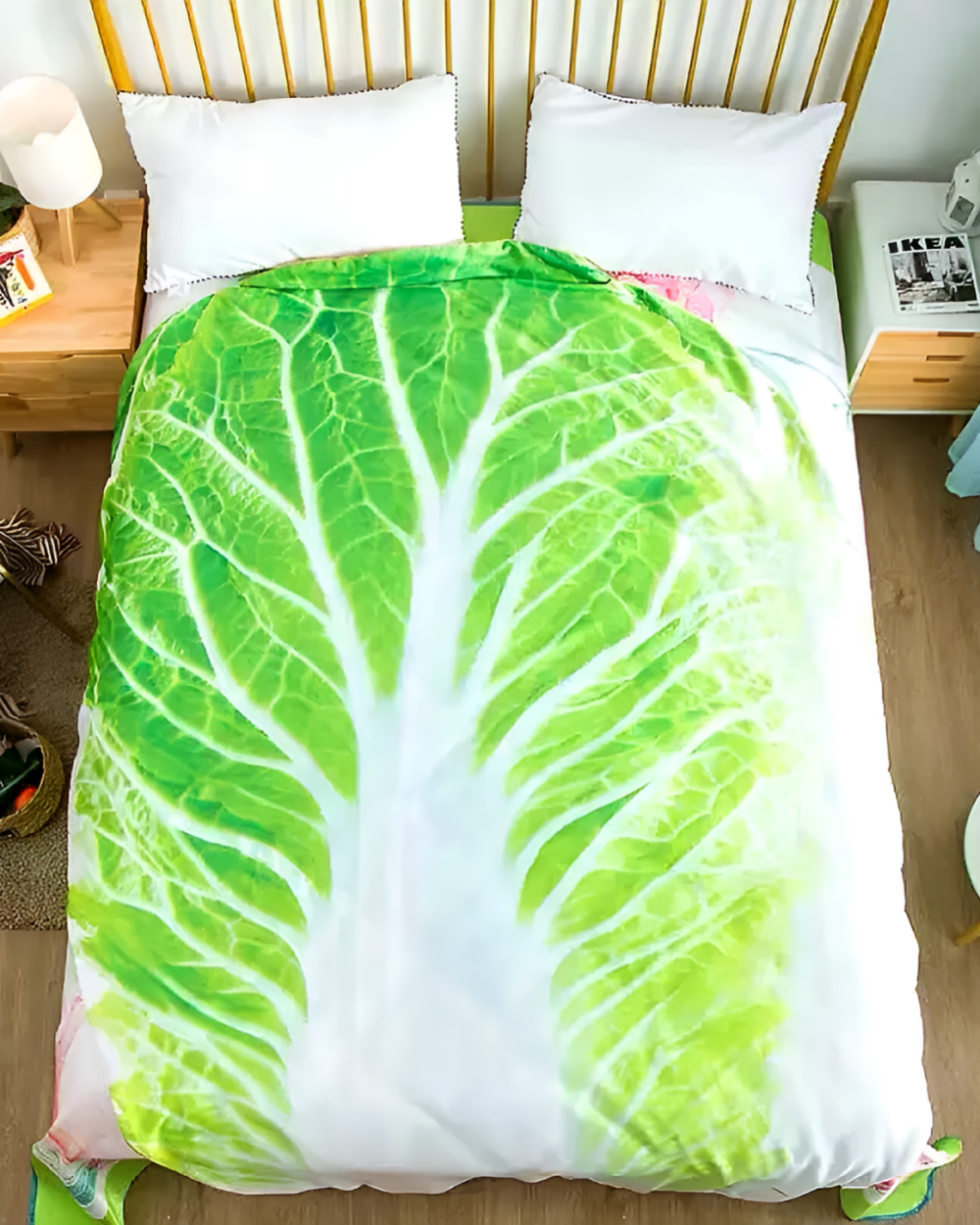 Close-up view of a Lettuce Blanket featuring a large, detailed cabbage leaf pattern on a white background.