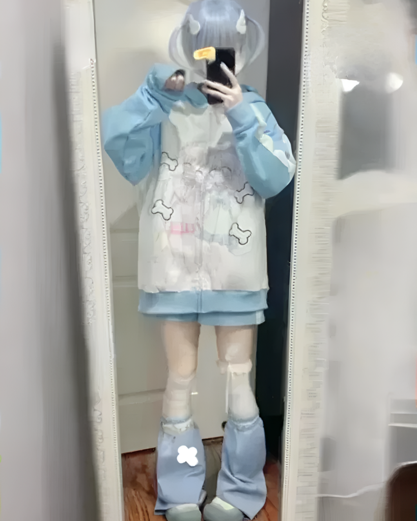 Person wearing the cute aesthetic hoodie and thigh-high socks.