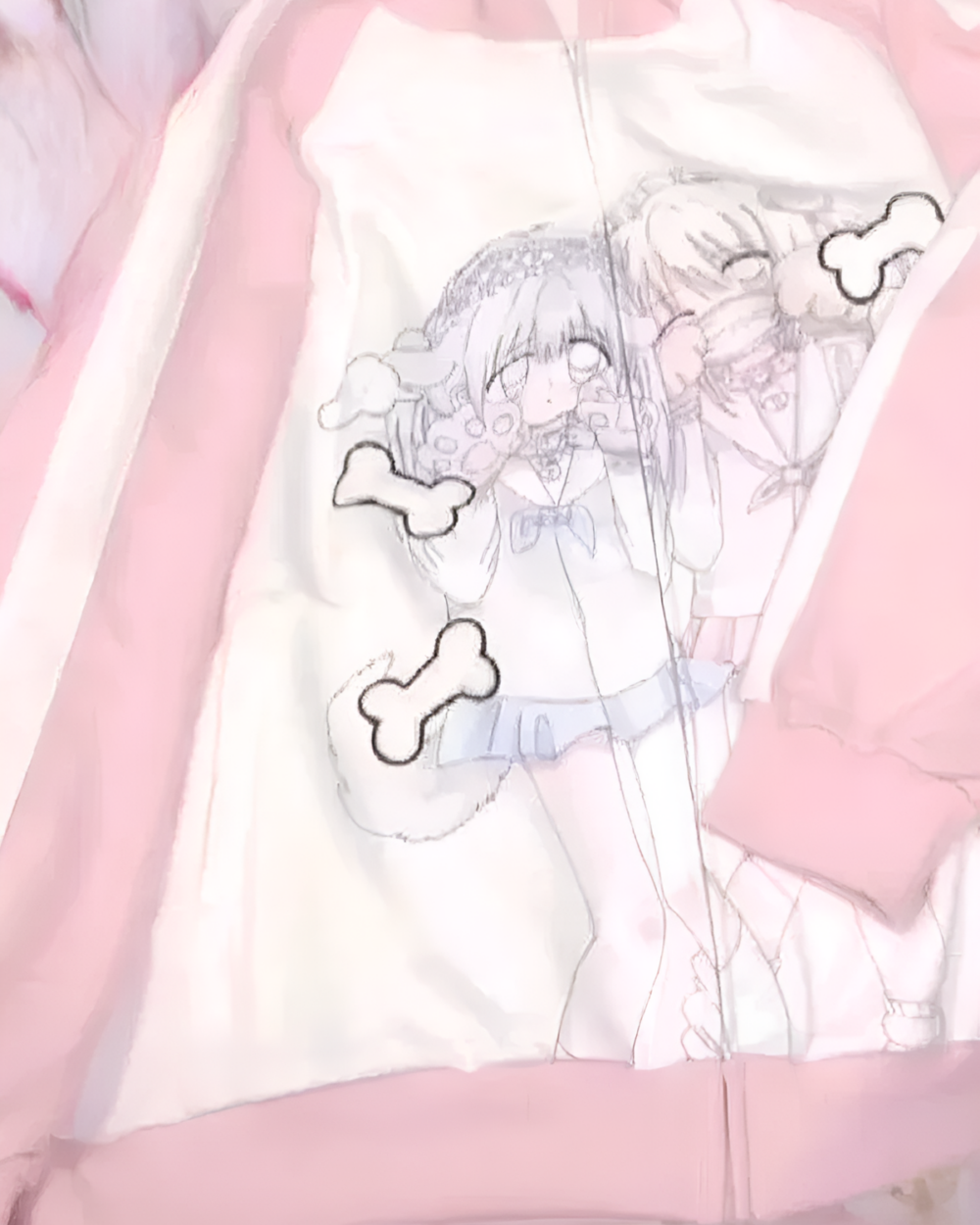 The Soft Puppy Hoodie features a cute aesthetic hoodie design with a drawn anime character and dog bones.