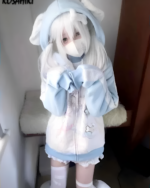 A person wearing the cute aesthetic hoodie, featuring a soft, puppy-like design.