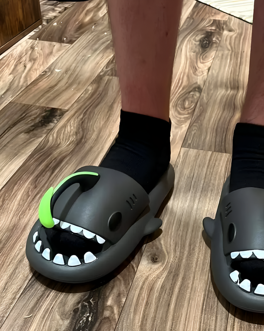 Thick and Comfy Anglerfish Sandals product photo 3 Gray Anglerfish Sandals with a smiling face and teeth. Thick and comfy footwear.