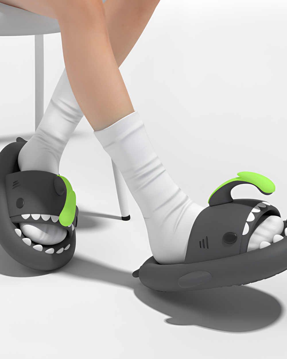 Thick and Comfy Anglerfish Sandals featuring a shark design on gray and teal footwear.