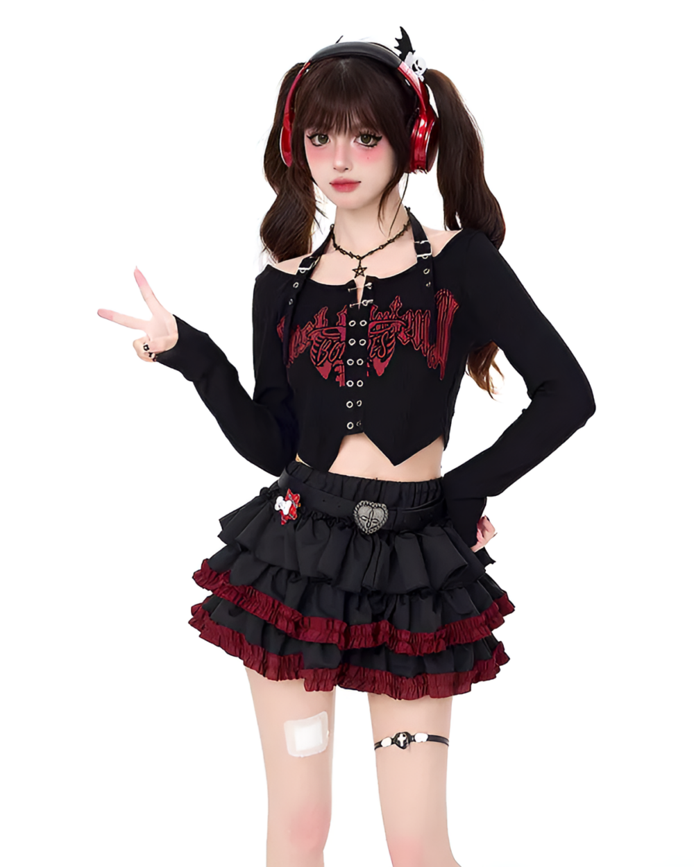 Model wearing the Venom Heart Ruffle Skirt set, a black and red two-piece outfit with a ruffled mini skirt.