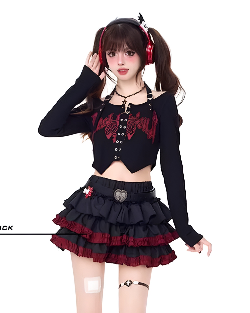 Model wearing a black long sleeve top and a Venom Heart Ruffle Skirt set. The skirt features a ruffled design.