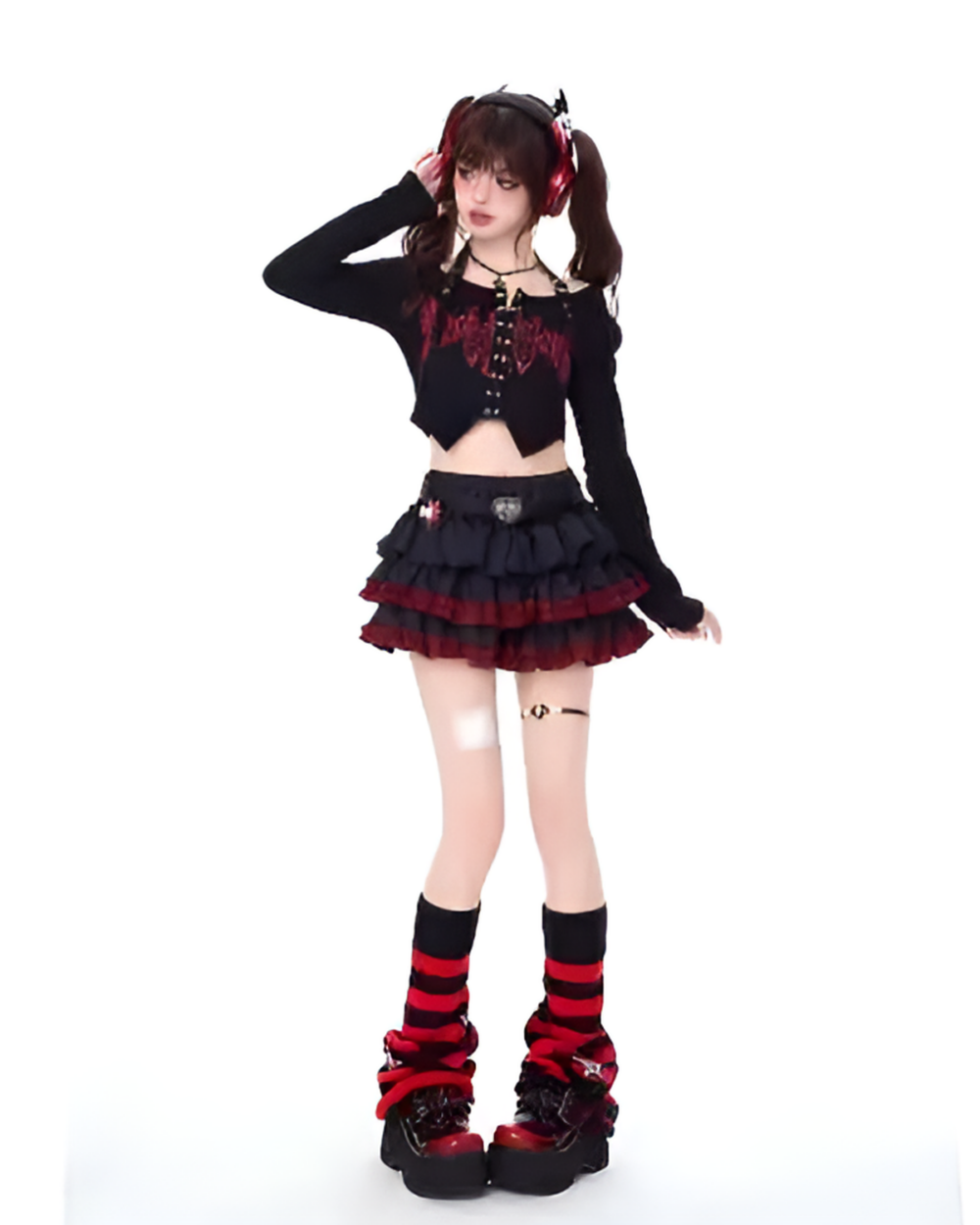 Model wearing the Venom Heart Ruffle Skirt set, a black and red ruffled mini skirt and long-sleeved crop top.