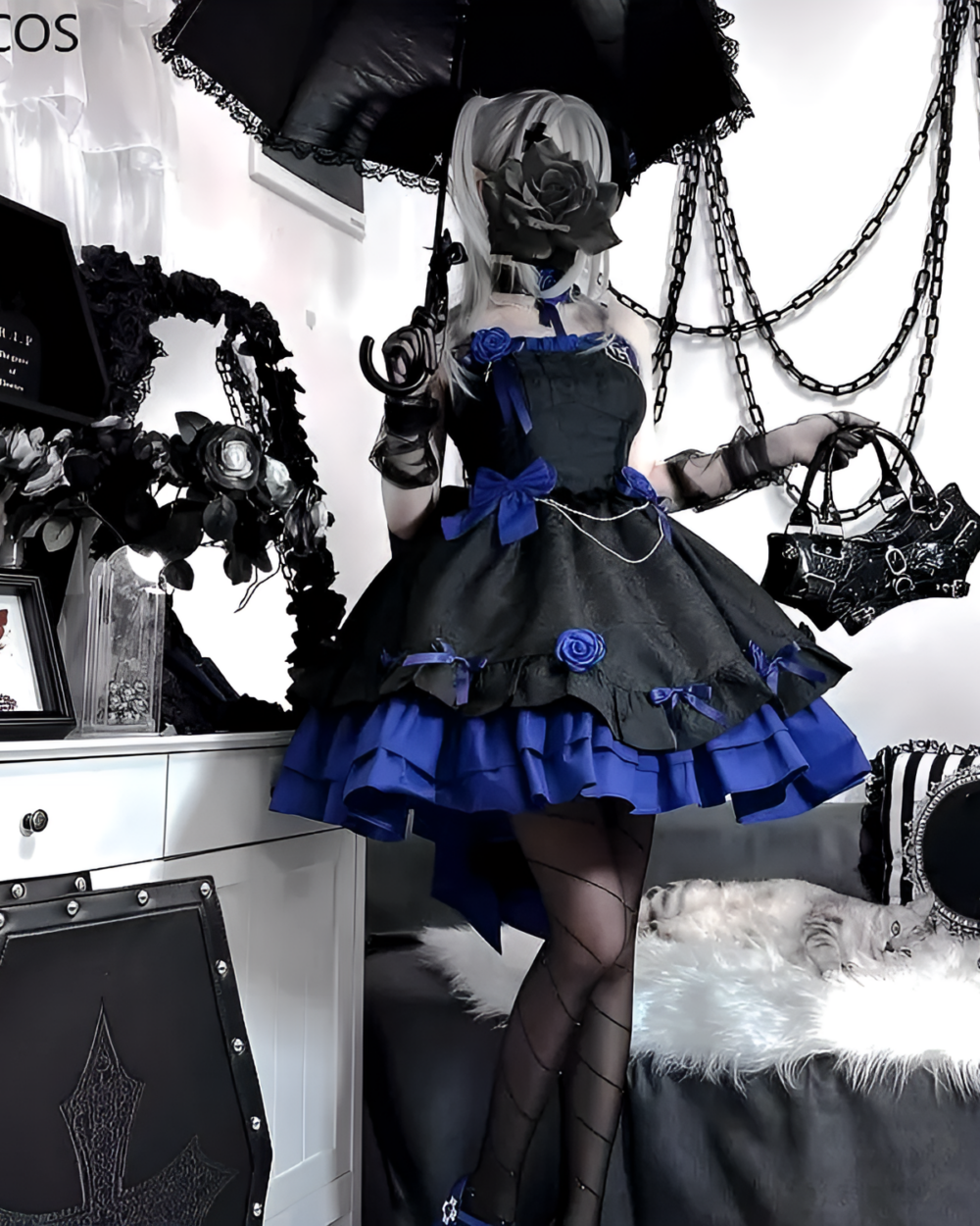 Victorian Dark Gothic Lolita Dress worn by a model with accessories, black and royal blue color scheme.