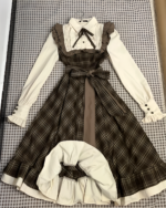 Vintage midi dress, cottagecore dress with long sleeves, pleated skirt, and bow details.