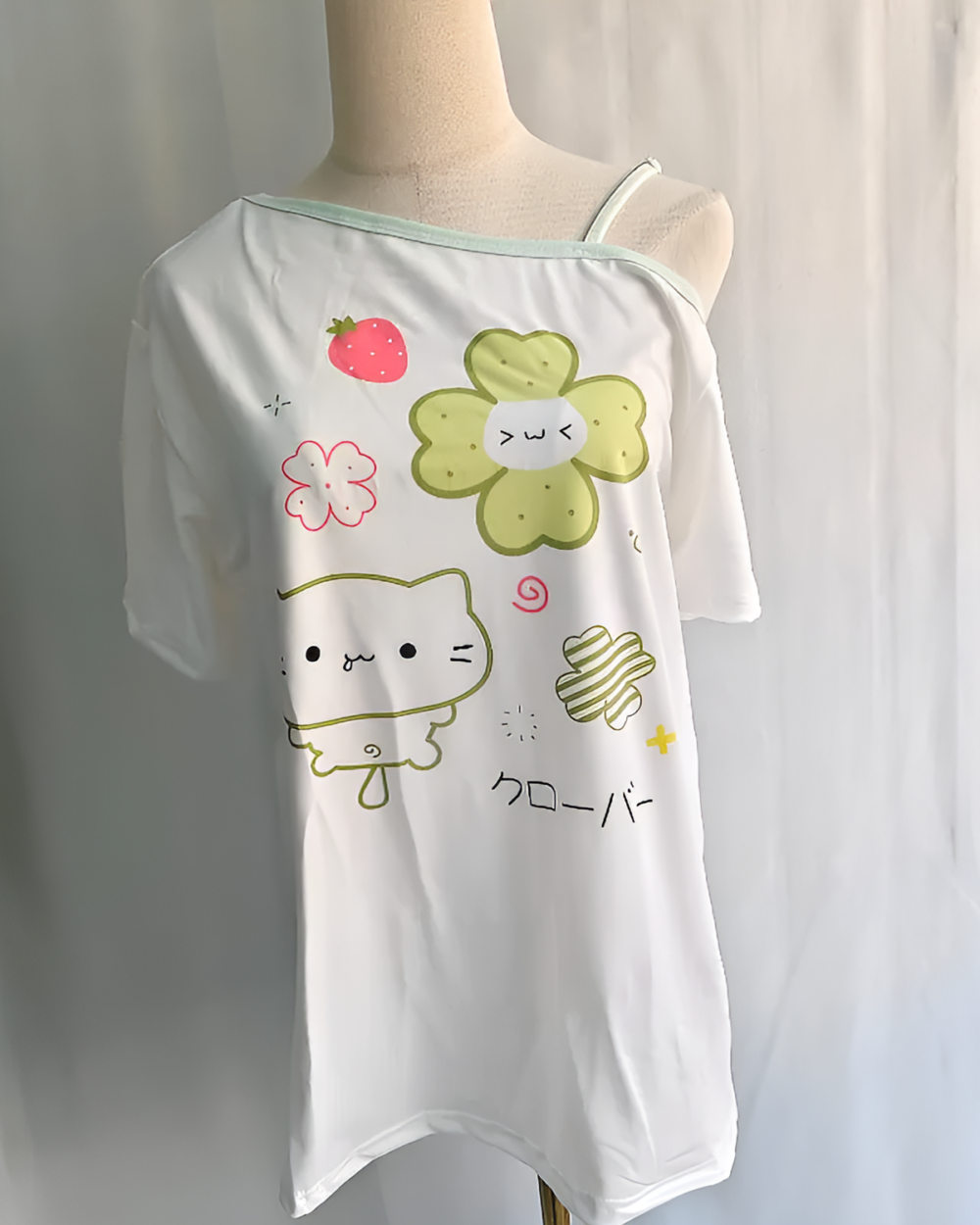 White Yotsuba Neko T-Shirts featuring a cute cat and strawberry design.